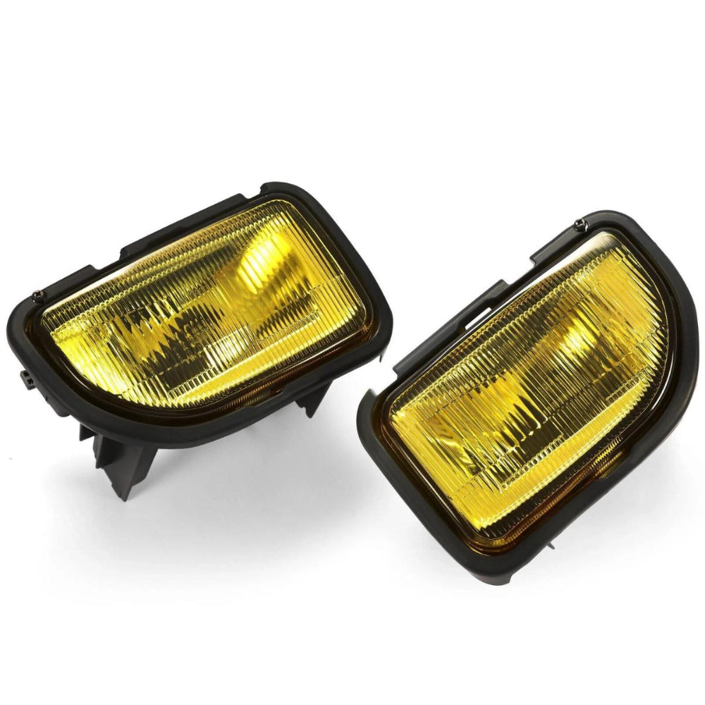 Two yellow fog lights with black casings on a white background